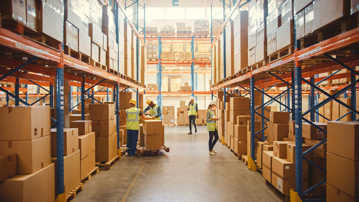 Retail Warehouse full of Shelves with Goods in Cardboard Boxes